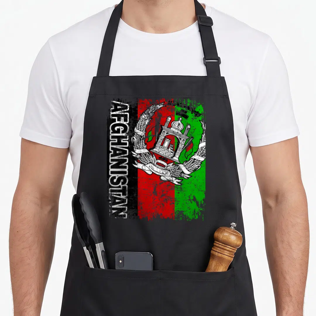 Funny afghanistan afghan apron - Distressed AFGHANISTAN text and white mosque emblem on black red green flag background — shown on a black cotton canvas apron against a white background