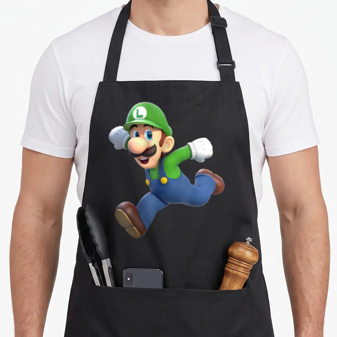 Poster holiday apron - Luigi character in a jumping pose wearing green hat and blue overalls — shown on a black cotton canvas apron against a white background