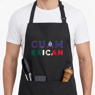 Mexican guam aprons - Stacked GUAM EXICAN text with flag emblems in red blue green and white distressed style — shown on a black cotton canvas apron against a white background