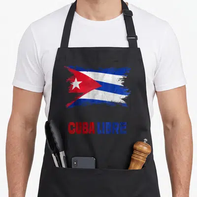 Libre cuba apron - Distressed Cuban flag print with CUBA LIBRE text in red and blue block letters — shown on a black cotton canvas apron against a white background