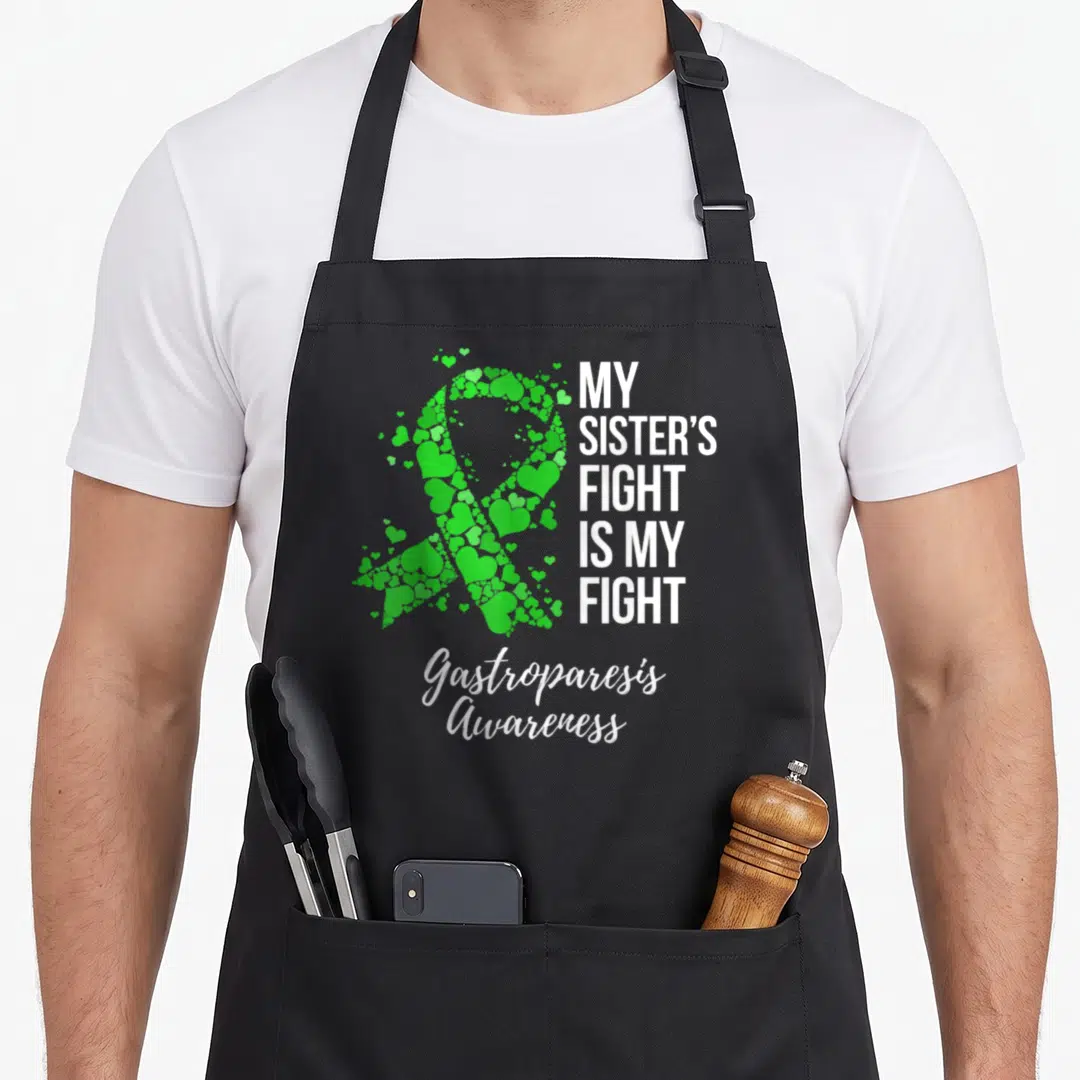 Sister gastroparesis awareness apron - Green heart awareness ribbon with My Sister Fight Is My Fight text — shown on a black cotton canvas apron against a white background