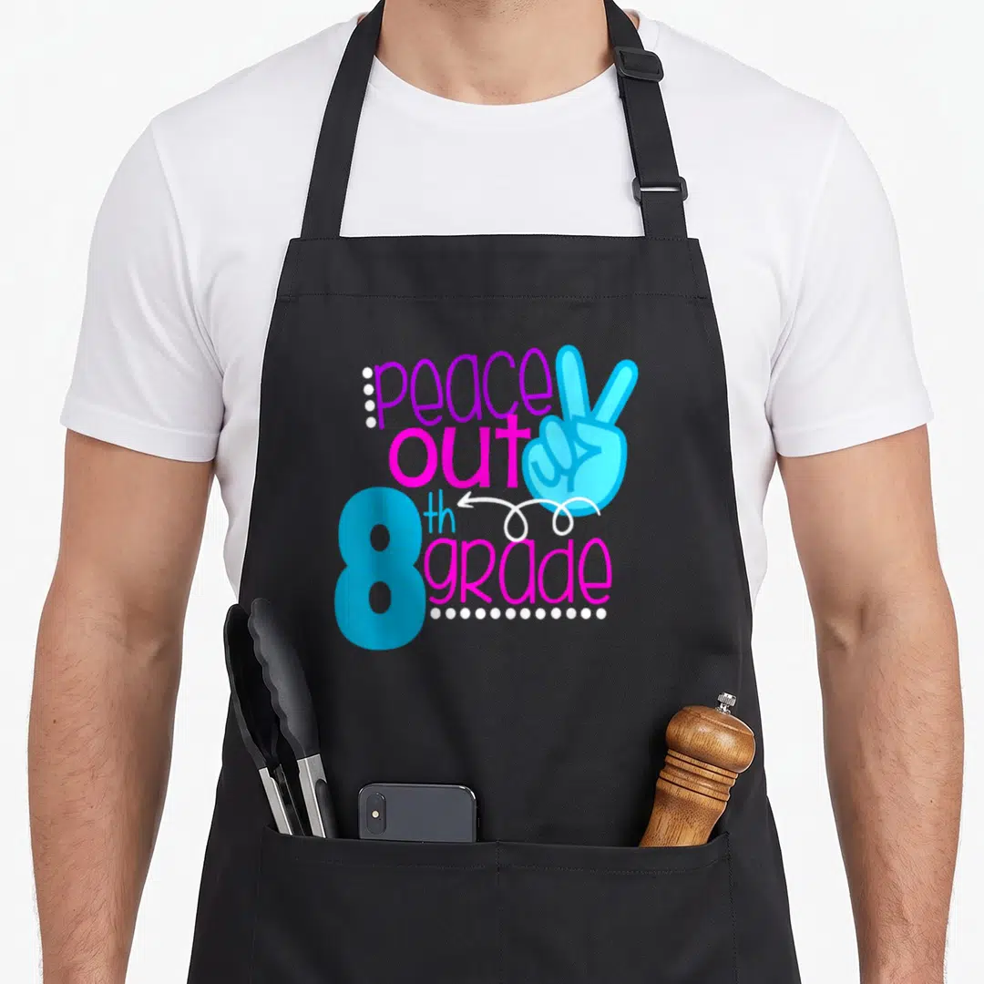School moving day apron - peace out 8th grade text with blue peace sign hand and white dots on black background — shown on a black cotton canvas apron against a white background