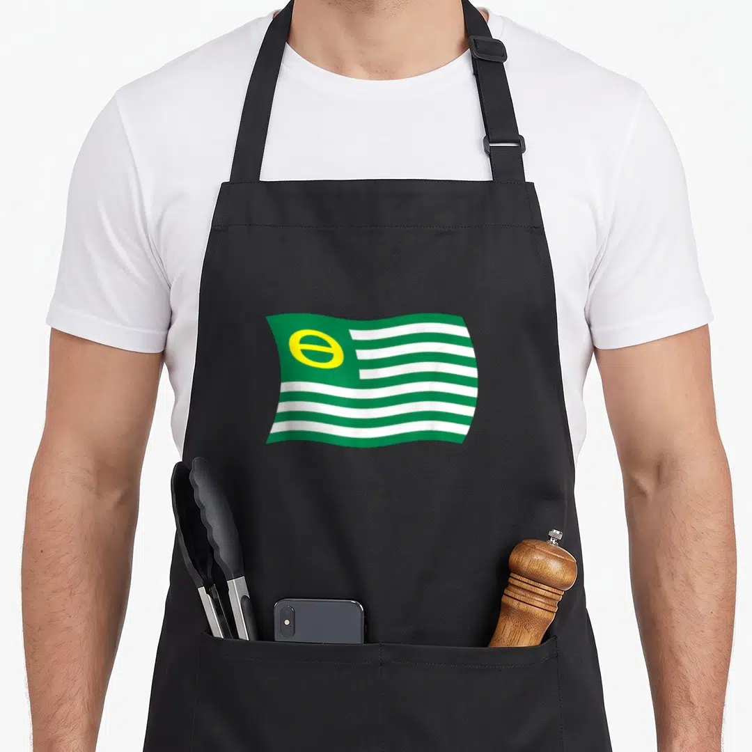 Ecology change apron - Waving flag with green white stripes and yellow emblem on left side — shown on a black cotton canvas apron against a white background