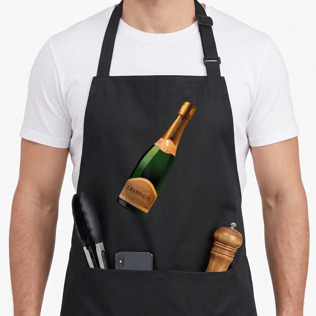 Wine champagne apron - Green champagne bottle with gold 1993 label and small glass on neck — shown on a black cotton canvas apron against a white background