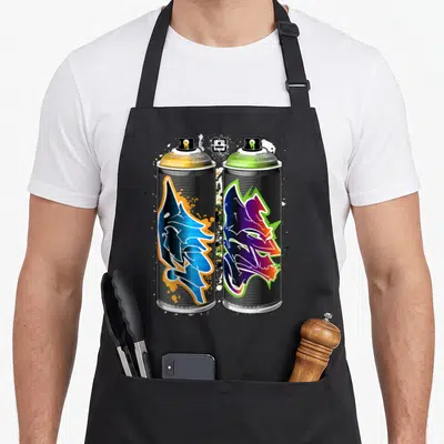 Graffiti urban apron - Two spray cans with blue orange and purple green graffiti art on black bodies — shown on a black cotton canvas apron against a white background