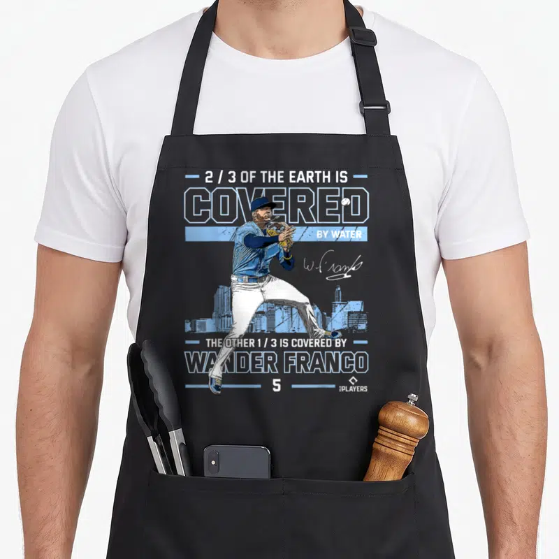 Wander tampa apron - Baseball player fielding pose with 2/3 earth covered by Wander Franco text — shown on a black cotton canvas apron against a white background