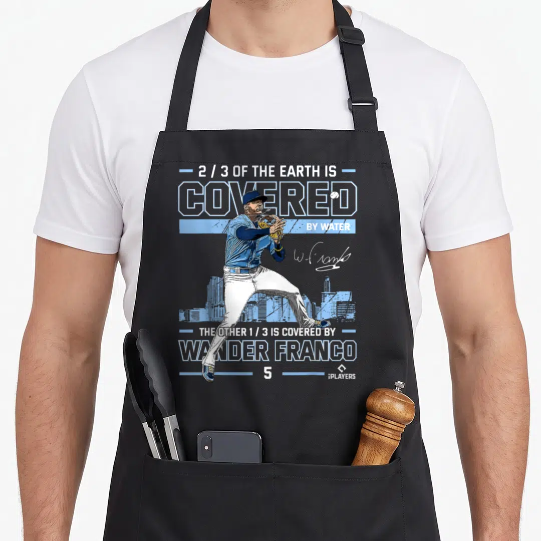 Wander tampa apron - Baseball player fielding pose with 2/3 earth covered by Wander Franco text — shown on a black cotton canvas apron against a white background