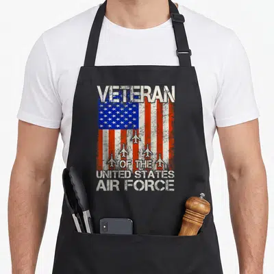 Force usaf us aprons - Distressed US flag with five jets and veteran text in white block letters — shown on a black cotton canvas apron against a white background