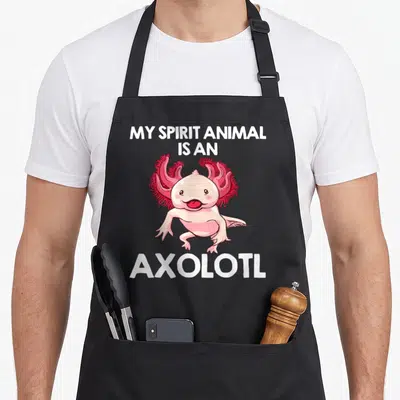 Axolotl biology animal apron - White text My Spirit Animal Is An Axolotl surrounding a pink cartoon axolotl on black — shown on a black cotton canvas apron against a white background
