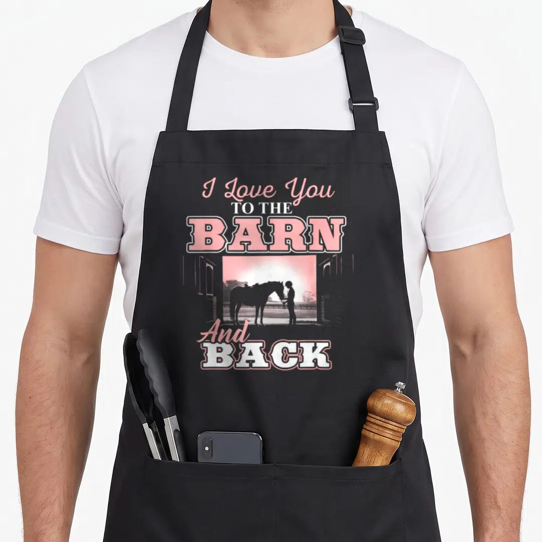 Barn riding horse apron - Pink and white text I Love You to the Barn and Back with horse silhouette — shown on a black cotton canvas apron against a white background