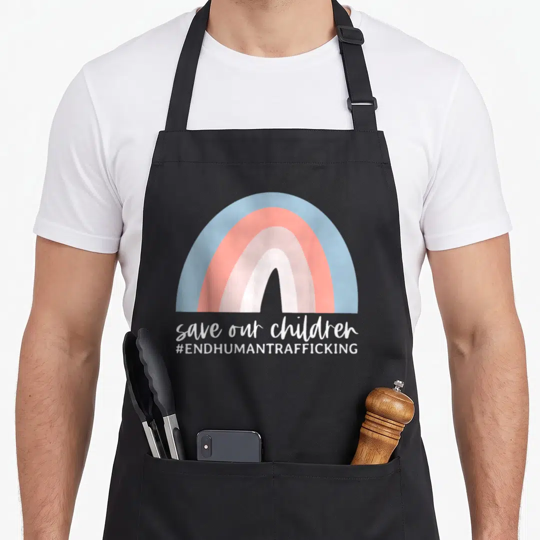 Our end human trafficking awareness apron - Pastel rainbow in blue peach pink white above save our children hashtag end — shown on a black cotton canvas apron against a white background