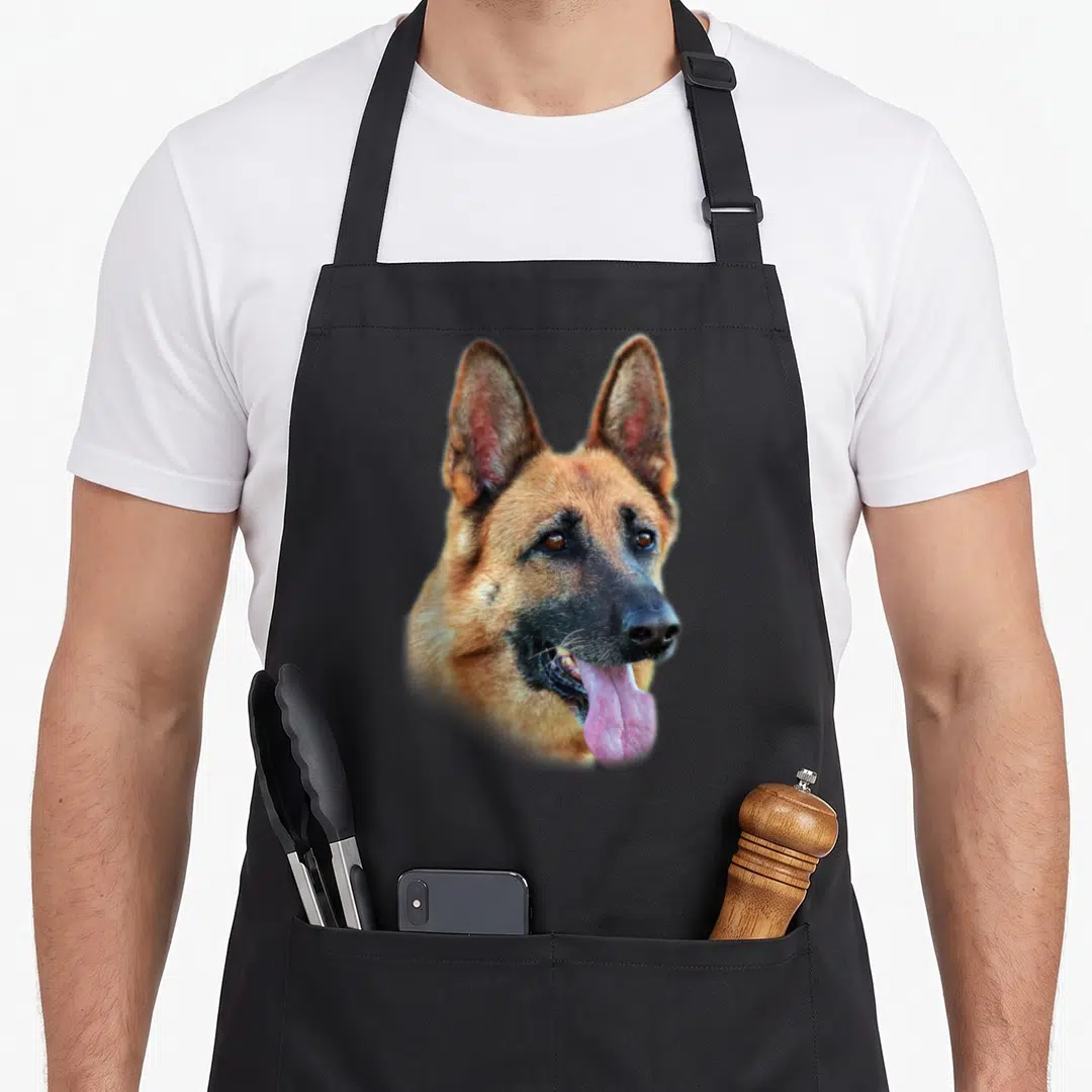 Face german apron - Realistic German Shepherd head photo print with brown black tan and pink fur — shown on a black cotton canvas apron against a white background