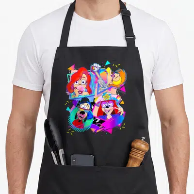 Movie bubble apron - Four cartoon characters in pink blue yellow red geometric cluster — shown on a black cotton canvas apron against a white background