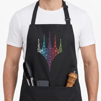 Rainbow icon magic apron - Trident shape made of skulls suns drops moons in white blue purple red green gradient — shown on a black cotton canvas apron against a white background