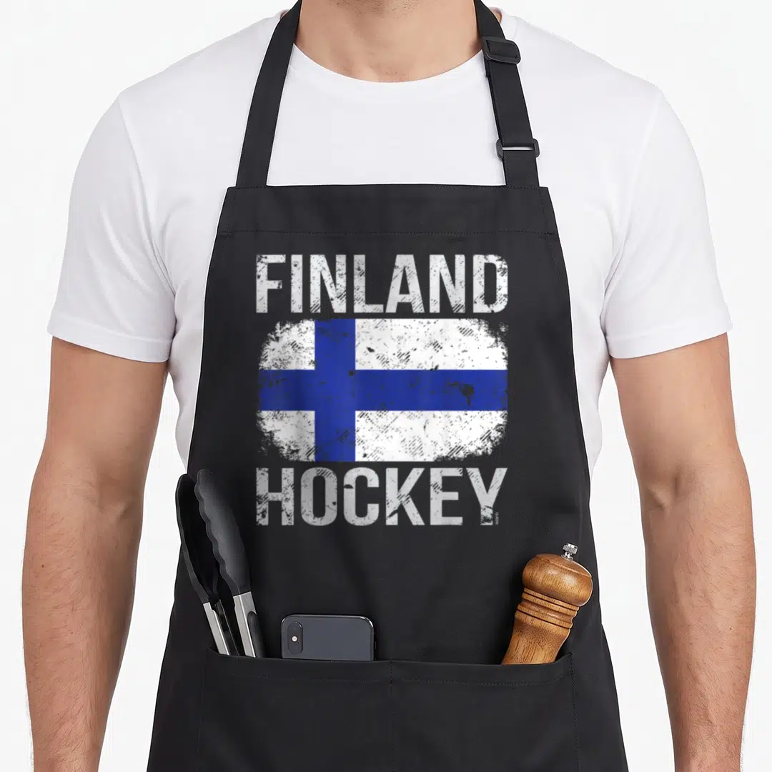 Finland nofo co apron - Distressed white and blue Finnish flag with Finland Hockey text — shown on a black cotton canvas apron against a white background