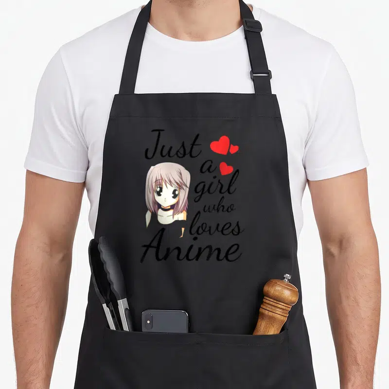 Anime kawaii aprons - Anime girl with purple hair next to stacked text and three red hearts — shown on a black cotton canvas apron against a white background