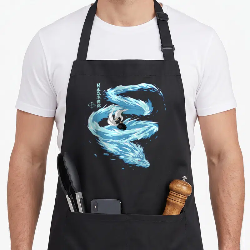 Toshiro dragon apron - Blue ice dragon winding around a sword-wielding man with Japanese characters to the left — shown on a black cotton canvas apron against a white background