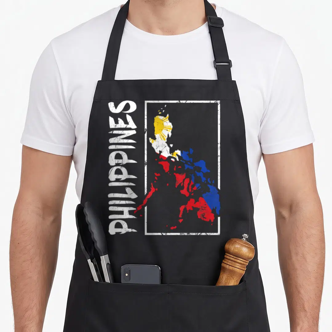 Flag filipino pride apron - Vertical PHILIPPINES text beside a distressed map of the islands filled with white, blue — shown on a black cotton canvas apron against a white background