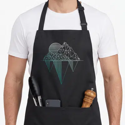 Climbing camping apron - Geometric mountain and sun in white and light blue line art with mirrored reflection — shown on a black cotton canvas apron against a white background