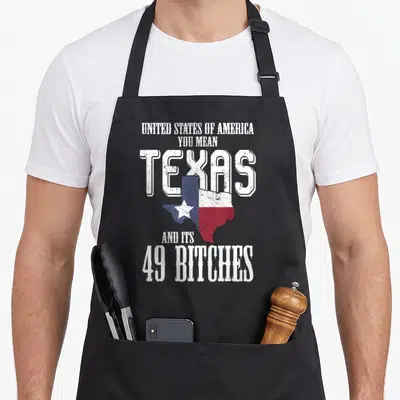 State texas flag apron - Stacked white text 49 bitches overlapped by Texas state map filled with red white and blue — shown on a black cotton canvas apron against a white background