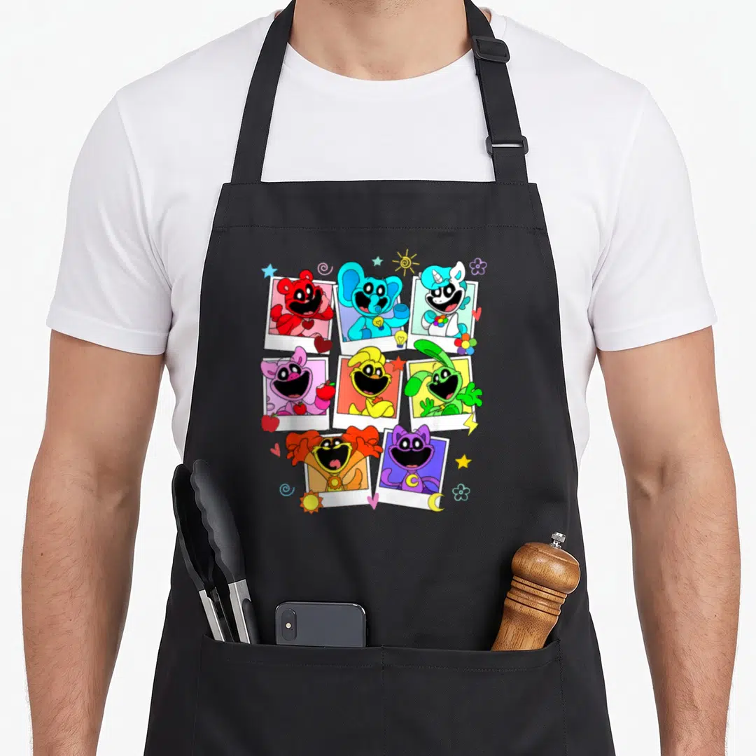 Poppy colorful aprons - Eight polaroid photos of colorful cartoon animals with stars and hearts — shown on a black cotton canvas apron against a white background
