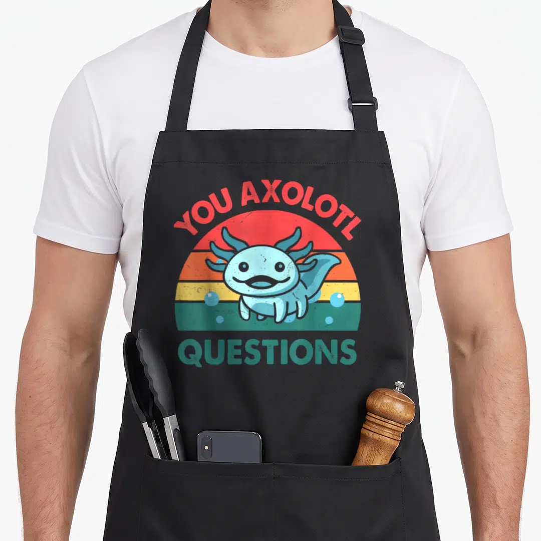 Question crazy axolotl man apron - Cartoon axolotl in front of striped sun with text YOU AXOLOTL QUESTIONS — shown on a black cotton canvas apron against a white background