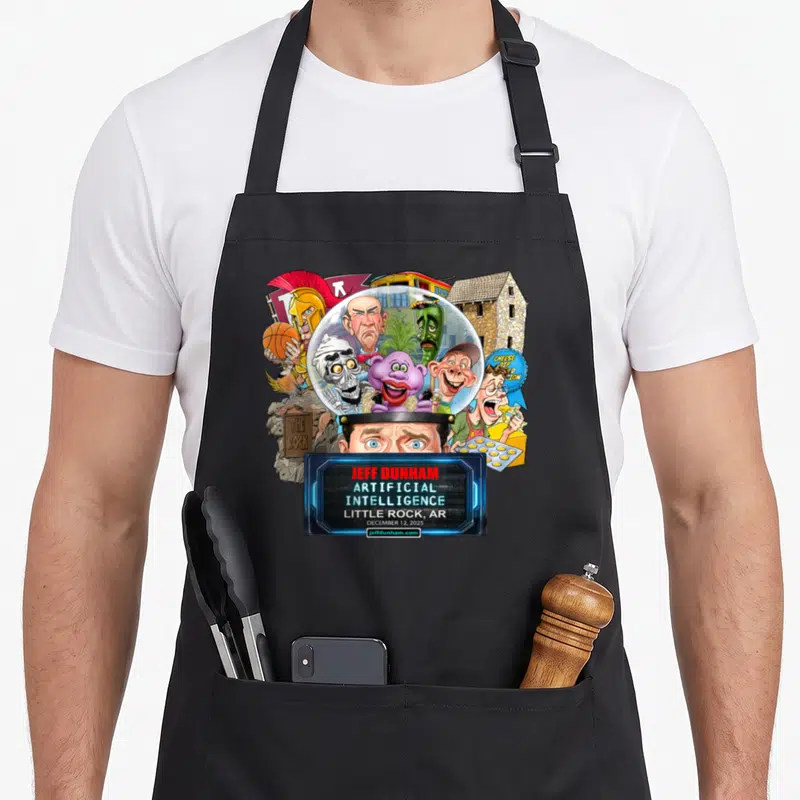 Jeff rock concert apron - Jeff Dunham Artificial Intelligence Little Rock AR Dec 12 2025 cartoon puppets in dome — shown on a black cotton canvas apron against a white background