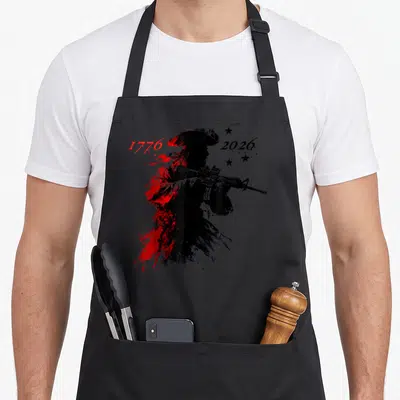 Patriotic yankees apron - Distressed soldier silhouette with rifle, red splatter, and years 1776 and 2026 — shown on a black cotton canvas apron against a white background