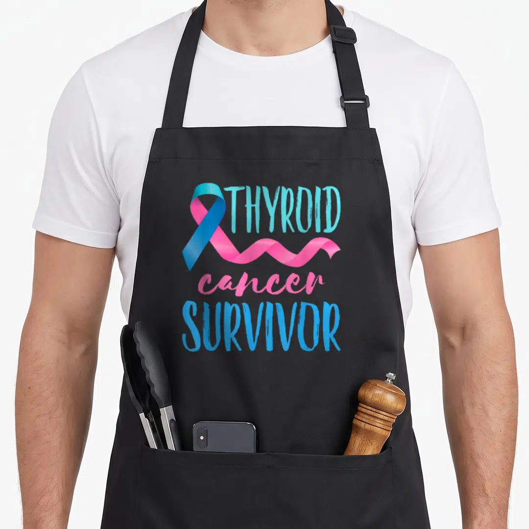 Thyroid cancer ribbon apron - Blue and pink awareness ribbon next to stacked THYROID cancer SURVIVOR text — shown on a black cotton canvas apron against a white background