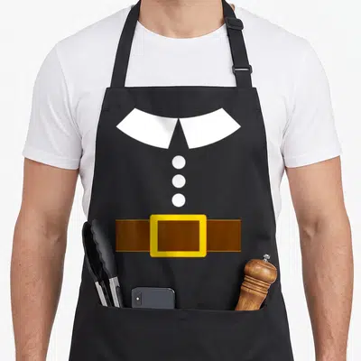 Costume thanksgiving day aprons - Minimalist pilgrim collar, three white buttons, brown belt with yellow buckle graphic — shown on a black cotton canvas apron against a white background