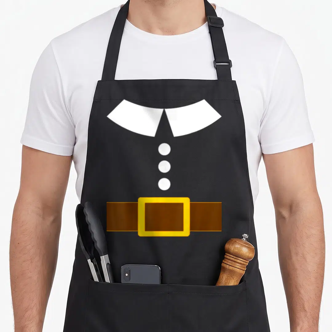 Costume thanksgiving day aprons - Minimalist pilgrim collar, three white buttons, brown belt with yellow buckle graphic — shown on a black cotton canvas apron against a white background