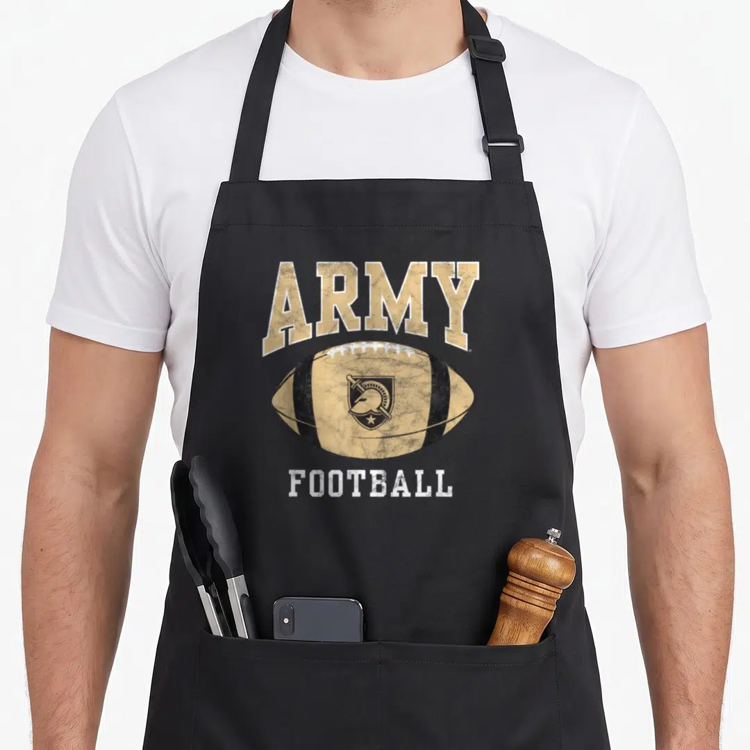 Army football apron - Gold ARMY FOOTBALL text with helmet shield on distressed football — shown on a black cotton canvas apron against a white background