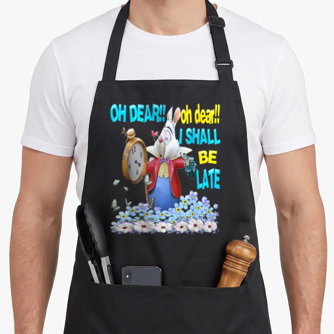 Funny alice rabbit apron - White Rabbit holding pocket watch with OH DEAR text and flowers in blue yellow red white — shown on a black cotton canvas apron against a white background