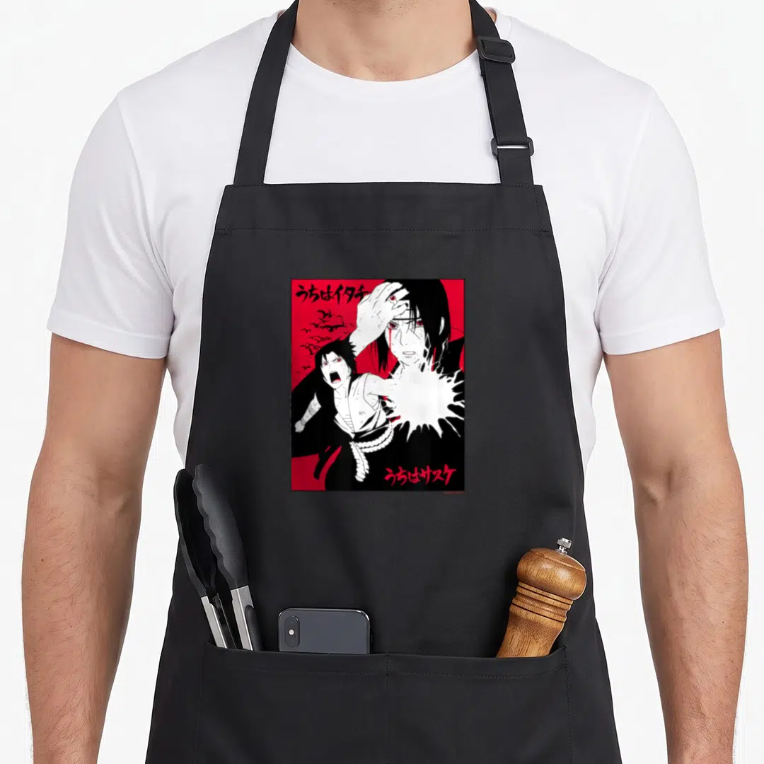 Itachi general apron - Two anime men on red background with Japanese text Uchiha Itachi and Sasuke — shown on a black cotton canvas apron against a white background