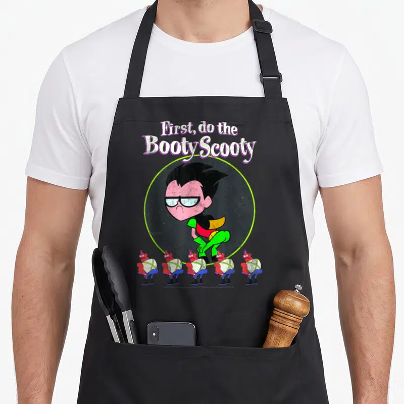 Booty robin lover apron - Robin in green-bordered circle with five demons below and stacked Booty Scooty text — shown on a black cotton canvas apron against a white background