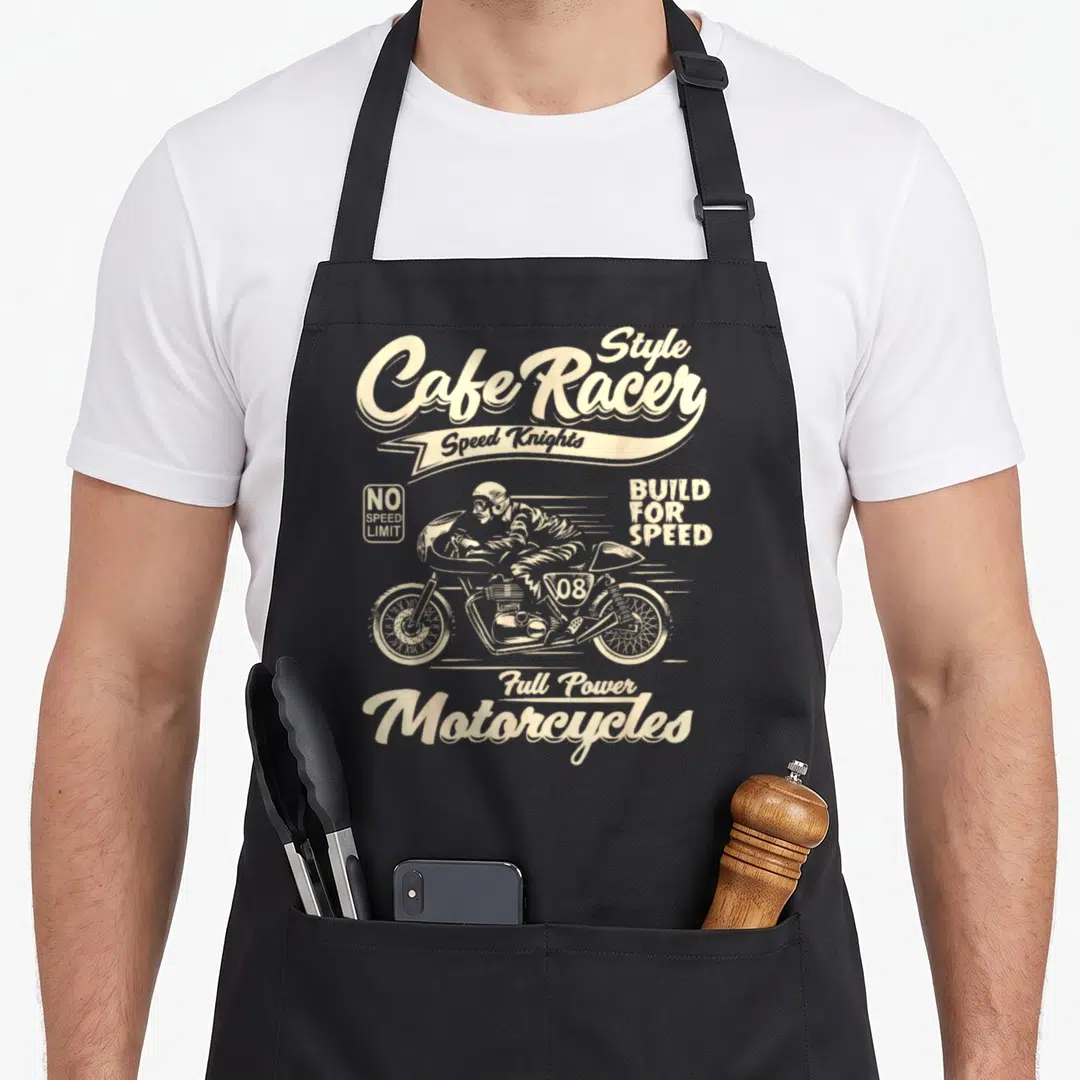 Biker cafe motorcycle apron - Beige line art of a rider on a motorcycle with Style Cafe Racer and No Speed Limit text — shown on a black cotton canvas apron against a white background