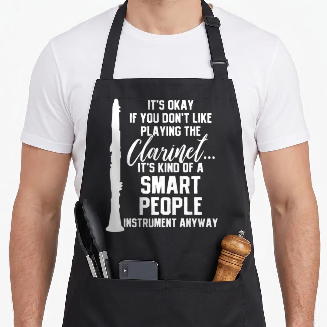 Player clarinet apron - White vertical clarinet silhouette next to stacked sarcastic text about smart people instruments — shown on a black cotton canvas apron against a white background