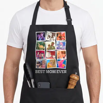 Movie mother's day aprons - Twelve polaroid photos of mothers and children above white BEST MOM EVER text — shown on a black cotton canvas apron against a white background