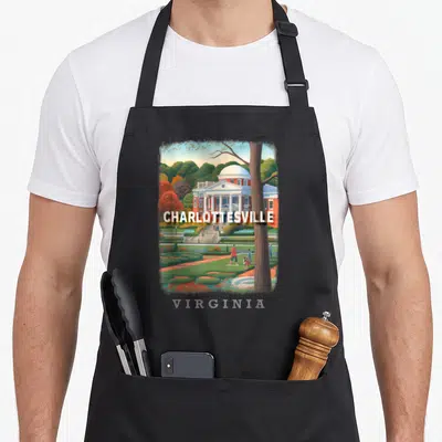 Historic charlottesville apron - Realistic Rotunda building with CHARLOTTESVILLE text and tree trunk in green and brown — shown on a black cotton canvas apron against a white background