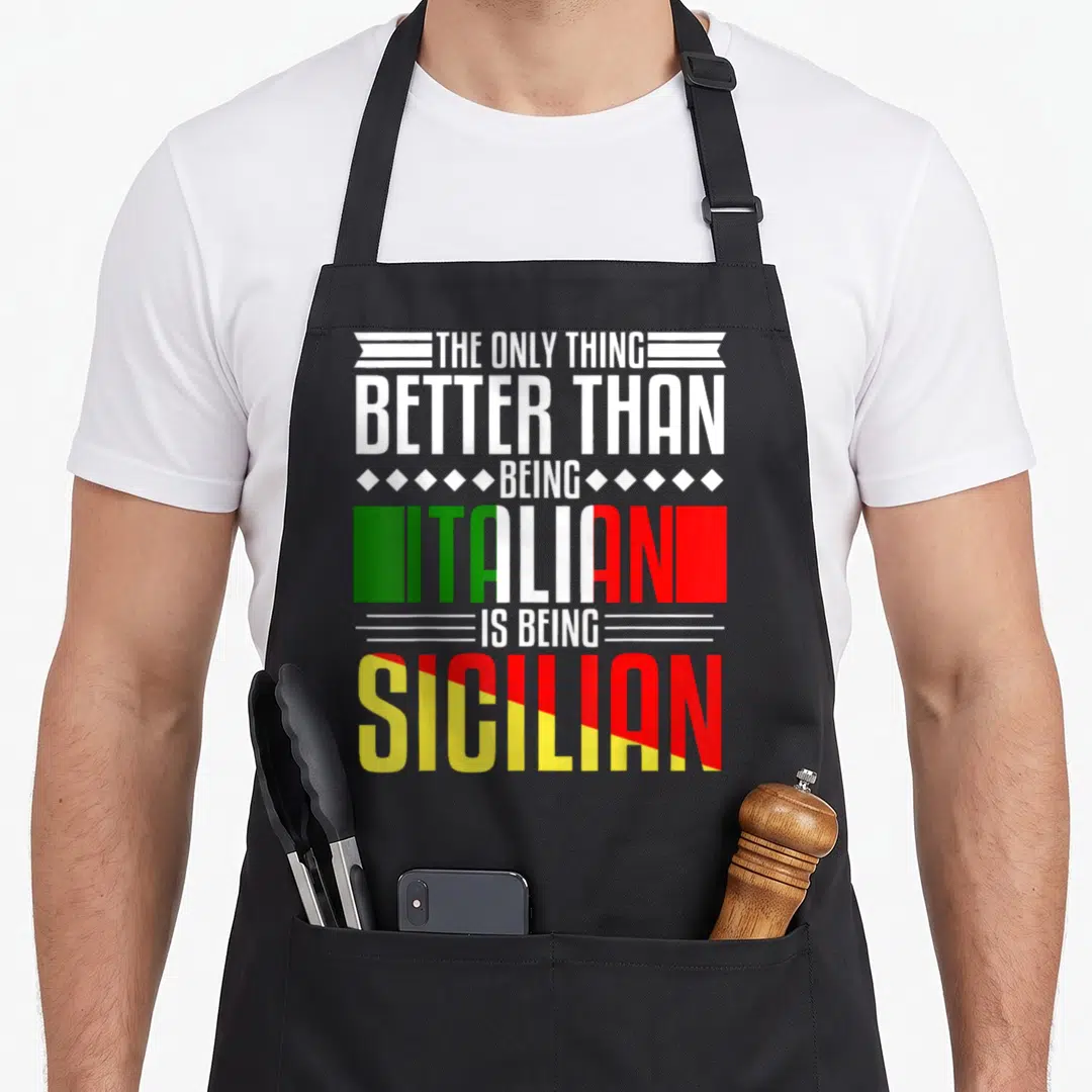 Better sicily apron - Stacked text reading THE ONLY THING BETTER THAN BEING ITALIAN IS BEING SICILIAN with flag colors — shown on a black cotton canvas apron against a white background