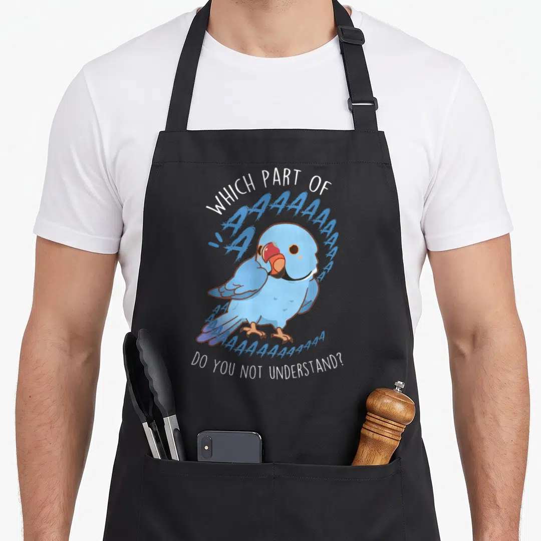 Aaa bird apron - Cartoon blue parrot with screaming A text and sarcastic quote — shown on a black cotton canvas apron against a white background