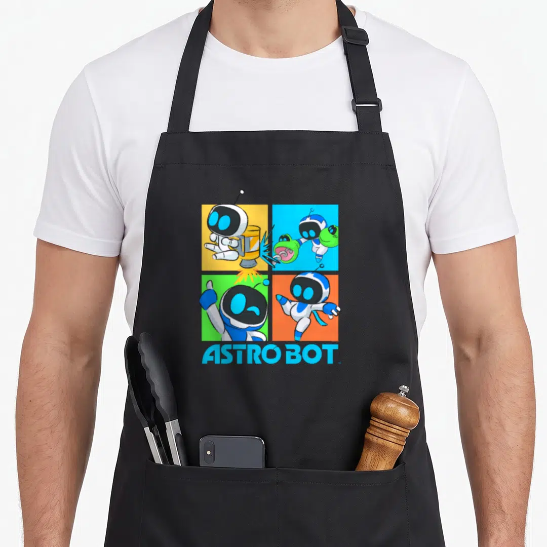 Rescue video game apron - Four colored robot squares with green alien and blue ASTRO BOT text — shown on a black cotton canvas apron against a white background