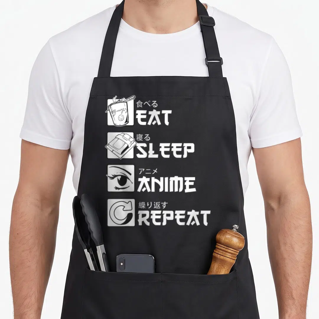 Eat anime apron - EAT SLEEP ANIME REPEAT text with ramen, futon, eye, and repeat icons in white squares — shown on a black cotton canvas apron against a white background