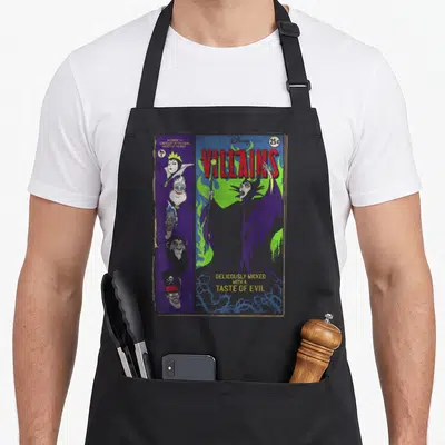 Villain wicked apron - Retro comic cover art of Maleficent with villains column and red Villains title text — shown on a black cotton canvas apron against a white background