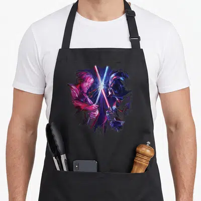 Duel the painted apron - Watercolor Luke Skywalker and Darth Vader in profile with crossed red blue purple and pink — shown on a black cotton canvas apron against a white background