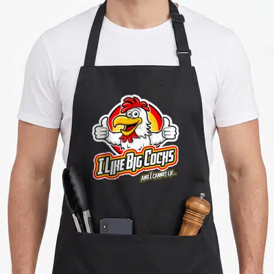Cannot chicken with apron - Cartoon rooster two thumbs up red yellow sun I LIKE BIG COCKS text — shown on a black cotton canvas apron against a white background