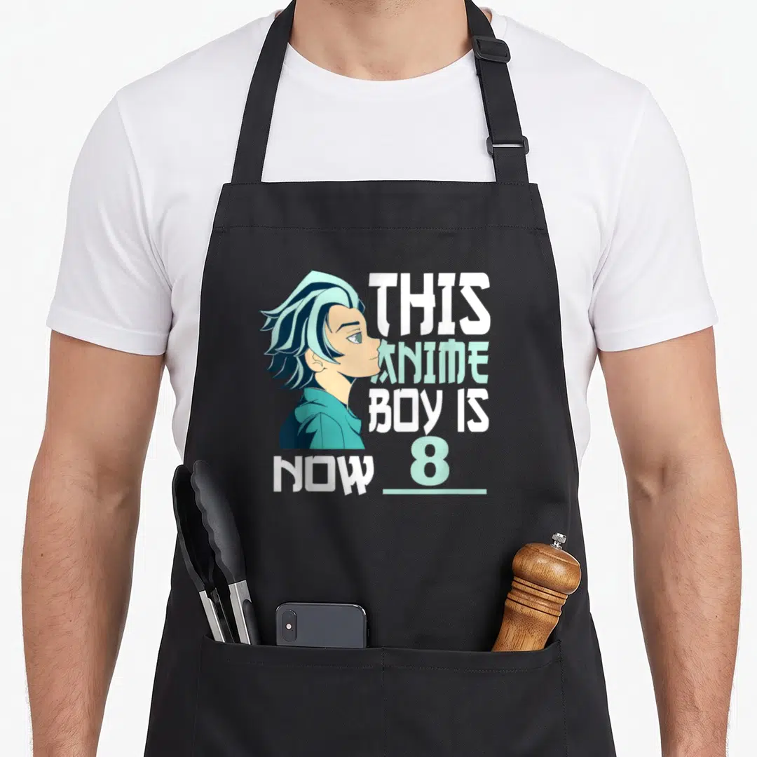 Funny manga anime mom apron - Stacked text reading THIS ANIME BOY IS NOW 8 beside a teal-haired anime boy profile — shown on a black cotton canvas apron against a white background