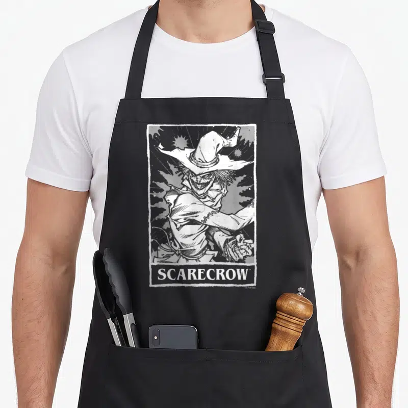 Scarecrow tarot halloween apron - Grey line art of a stitched scarecrow figure in a frame with SCARECROW text — shown on a black cotton canvas apron against a white background