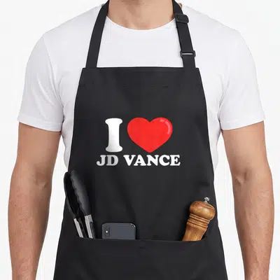 Vance i love van apron - White I and red heart above centered JD VANCE text — shown on a black cotton canvas apron against a white background
