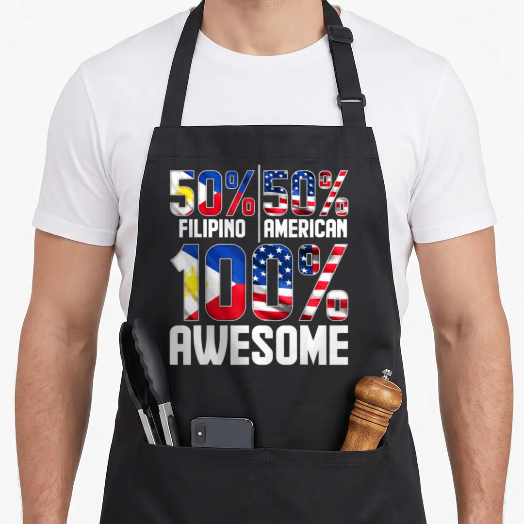 Funny filipino patriotic apron - 50% Filipino 50% American 100% Awesome flag typography design — shown on a black cotton canvas apron against a white background